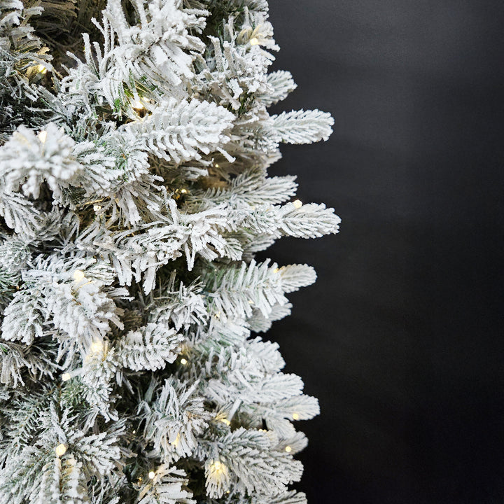 Noble Pole Flocked Fir Life-Like Artificial Christmas Tree