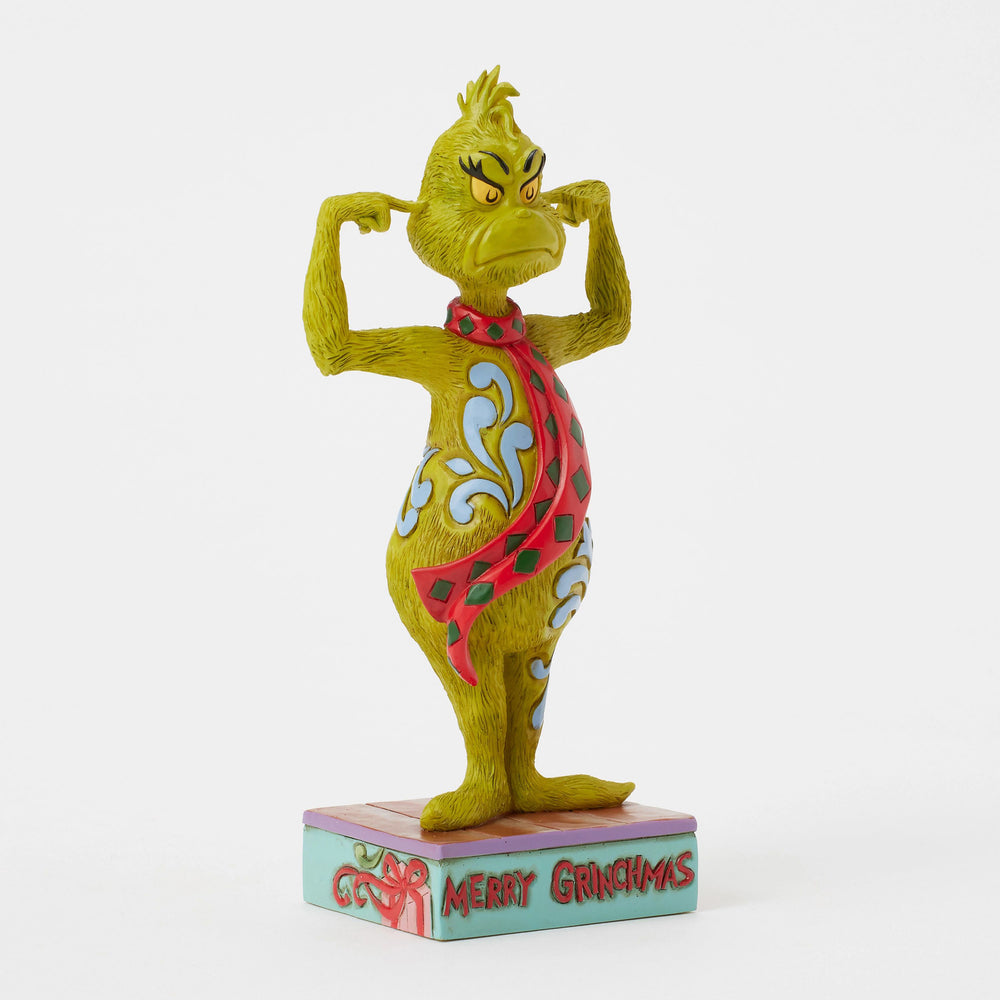 Grinch Plugging His Ears