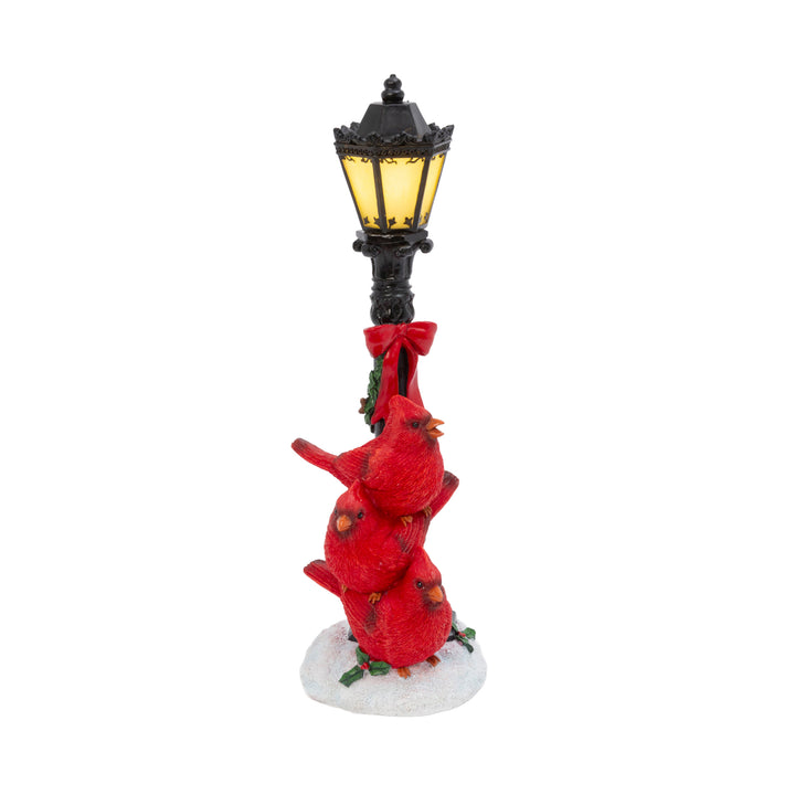 Lit Street Lamp with Cardinals