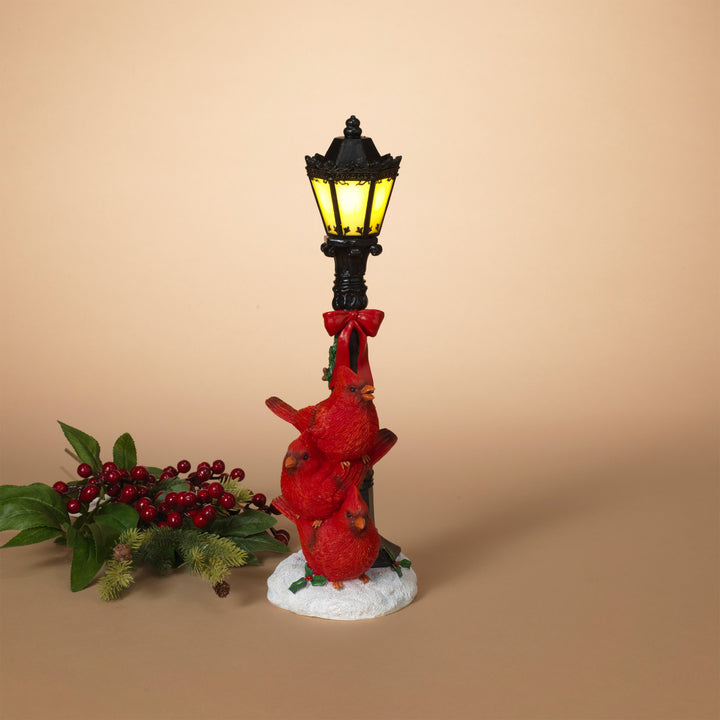 Lit Street Lamp with Cardinals