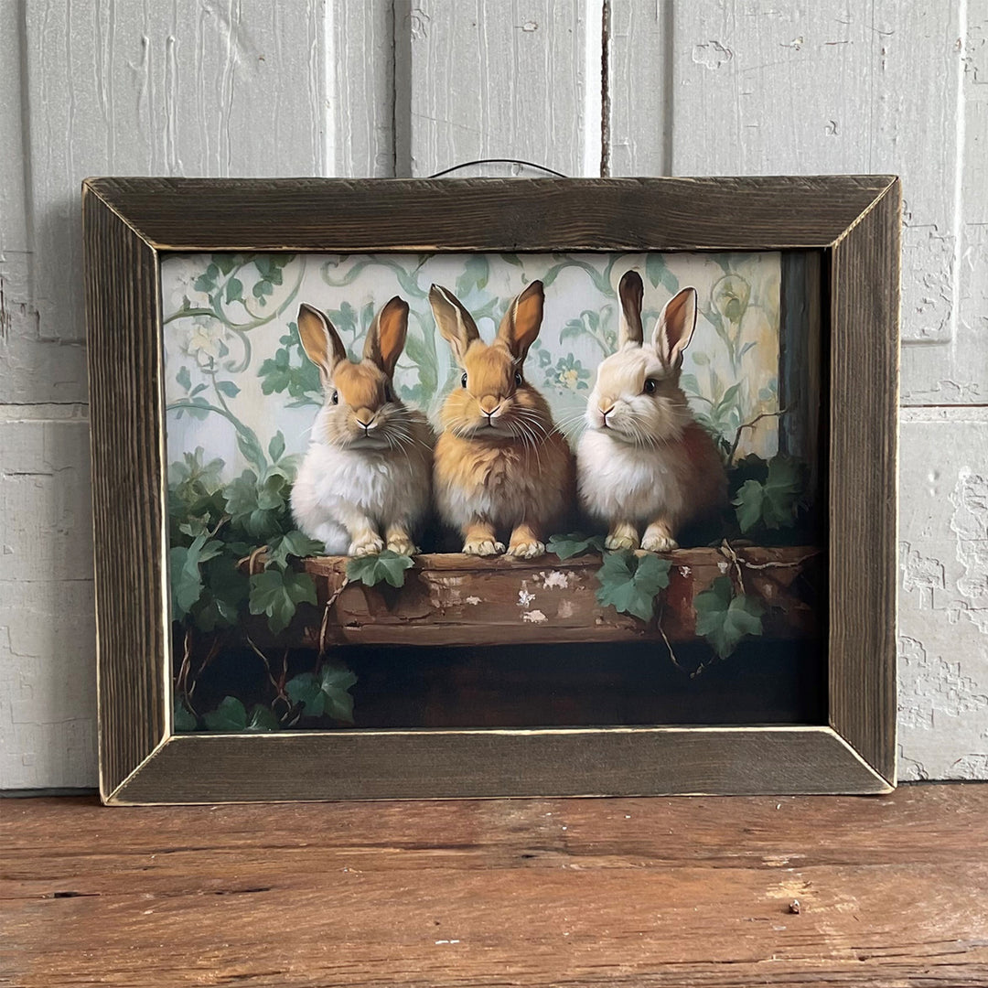 Three Bunnies on a Shelf Framed Wall Art