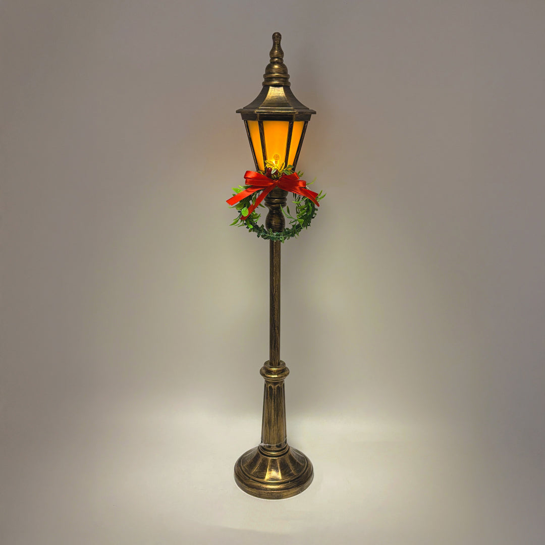 Lit Lamp Post with Festive Wreath