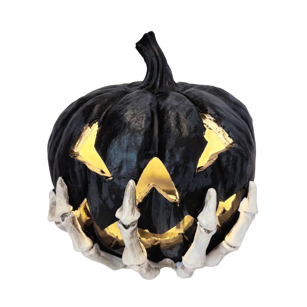Light Up Pumpkin in Skeleton Hand