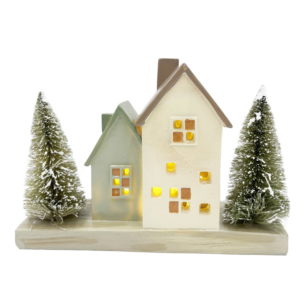 Lit Cottage Houses with Bottle Brush Trees