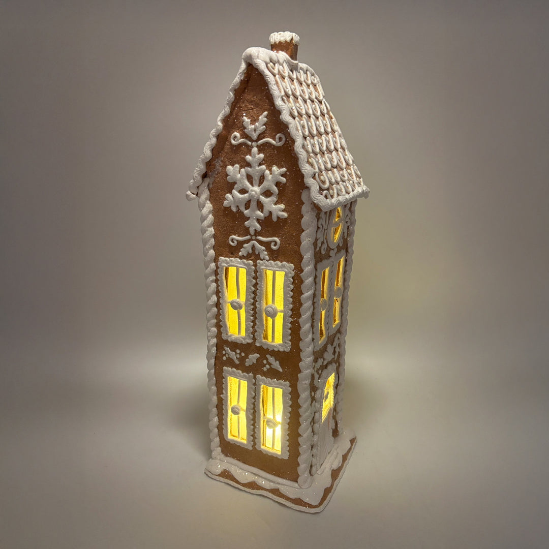Lit White Gingerbread House
