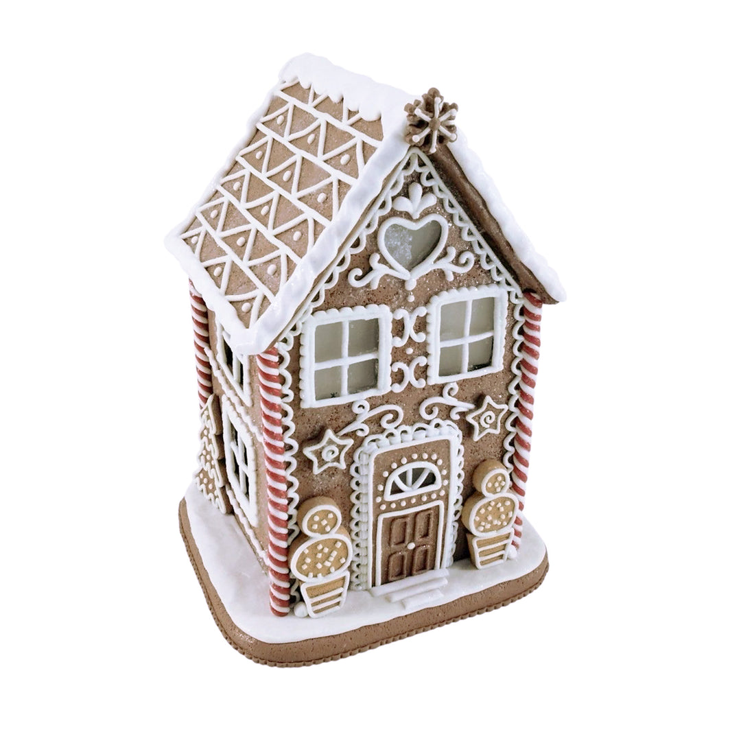 Lit Gingerbread House with Peppermint Columns